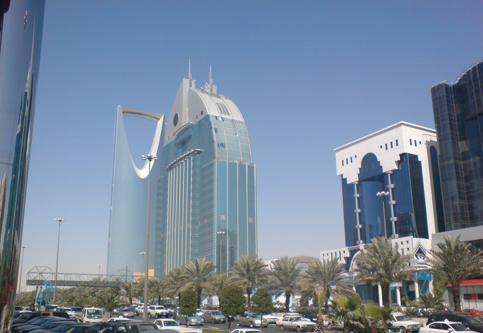 The Kingdom Centre and Al Anoud Tower against a blue sky
