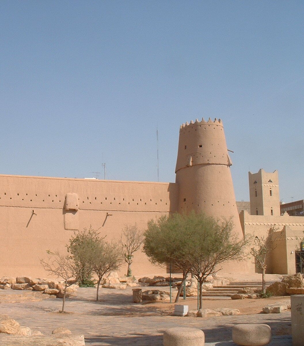 The round mud-brick tower and walls of Masmak Fortress